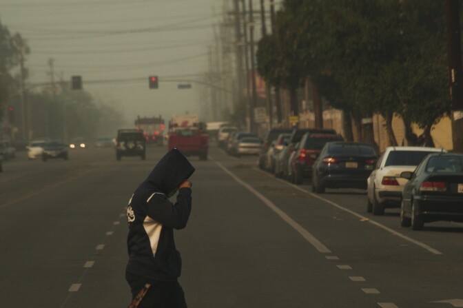 Thick smoke from the Creek Fire reduced visibility and made it difficult to breathe in downtown Sylmar on Dec. 5, 2017.