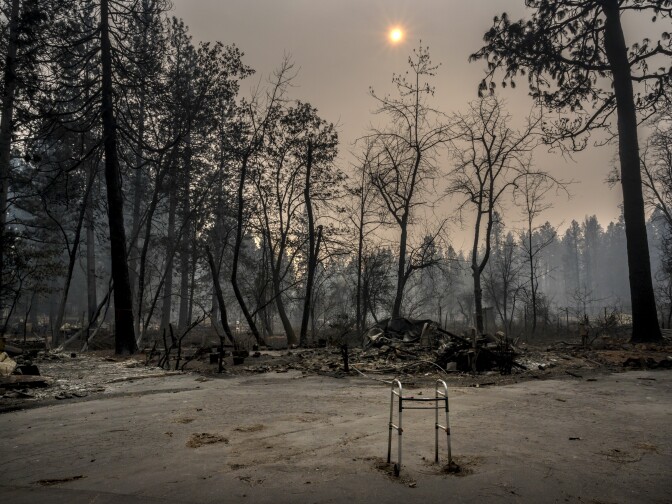 A walker remains abandoned on a cul-de-sac where most everything was destroyed inside the Pine Springs Mobile home park on Thursday Nov. 15, 2018 in Paradise, Calif. Many who perished in the tornado of fire were elderly. The Camp Fire's death toll is 88, while 158 remain missing, the Butte County Sheriff said in a tweet Tuesday night. It's the deadliest fire in California history. Mandatory Credit:  Renée C. Byer/The Sacramento Bee
