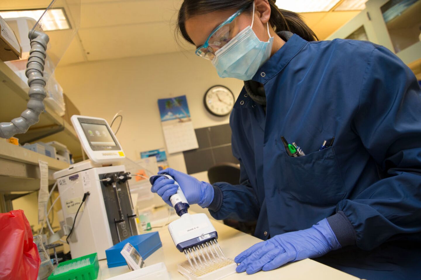 SEATTLE, WA - APRIL 17: Medical laboratory scientist, Alicia Bui, runs a clinical test in the Immunology lab at UW Medicine looking for antibodies against SARS-CoV-2, a virus strain that causes coronavirus disease (COVID-19) on April 17, 2020 in Seattle, Washington. The plasma she is examining came from donors who have recovered from COVID-19, a contagious respiratory illness, and may have the potential to help combat the disease in others. (Photo by Karen Ducey/Getty Images)