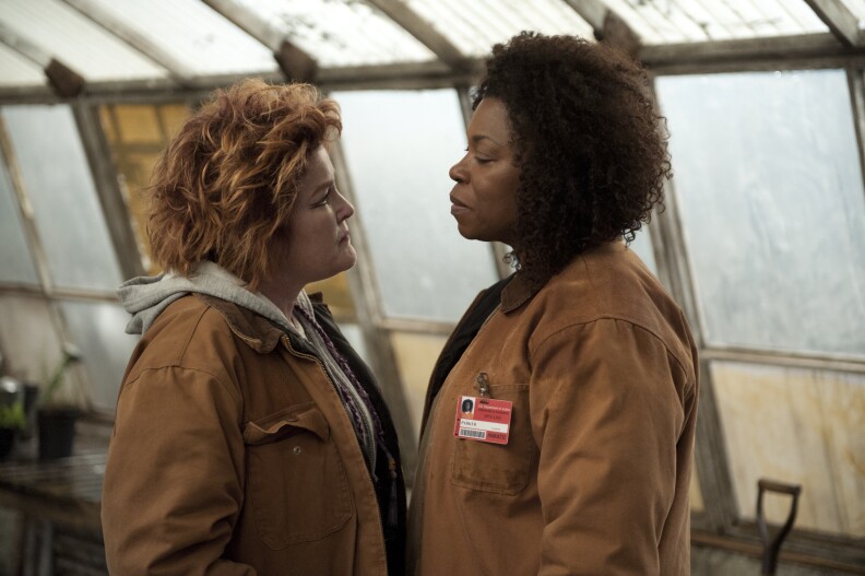 Kate Mulgrew (L) and Lorraine Toussaint (R) in a scene from Netflix’s “Orange is the New Black” Season 2. 