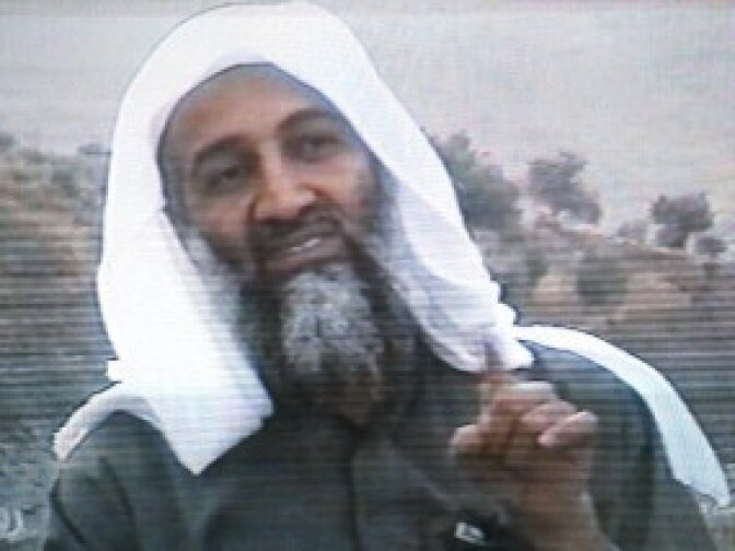 This frame grab from the Saudi-owned television network MBC (Middle East Broadcasting Center) shows Osama bin Laden gesturing an undated videotape.