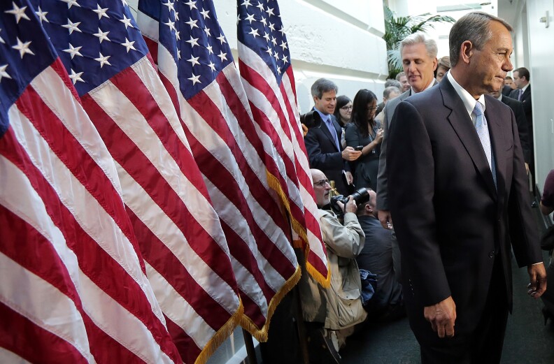 Speaker of the House Rep. John Boehner (R-OH) arrives for a press conference followiong a meeting of House Republicans at the U.S. Capitol October 15, 2013 in Washington, DC. The U.S. government shutdown is entering its fifteenth day as the U.S. Senate and House of Representatives remain gridlocked on funding the federal government.  