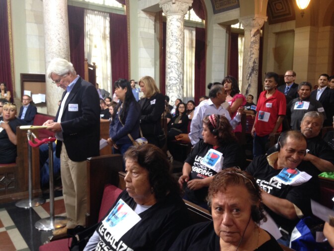 People line up in the City Council chambers to comment at a city Economic Development Committee meeting on possible plans to legalize street vending in Los Angeles. 