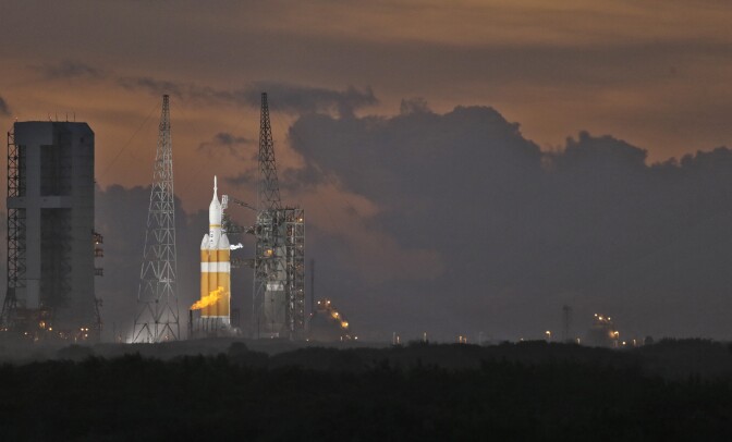 NASA's Orion spacecraft, atop a  United Launch Alliance Delta 4-Heavy rocket, sits on the launch pad before its first scheduled unmanned orbital test flight from the Cape Canaveral Air Force Station, Thursday, Dec. 4, 2014, in Cape Canaveral, Fla. (AP Photo/Chris O'Meara)