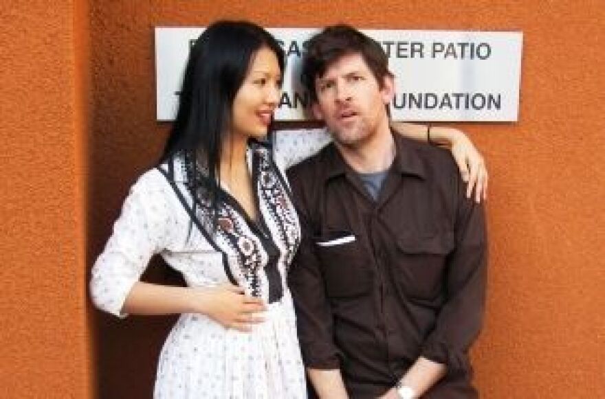 Gwendoline Yeo (L) and KPCC's John Rabe.