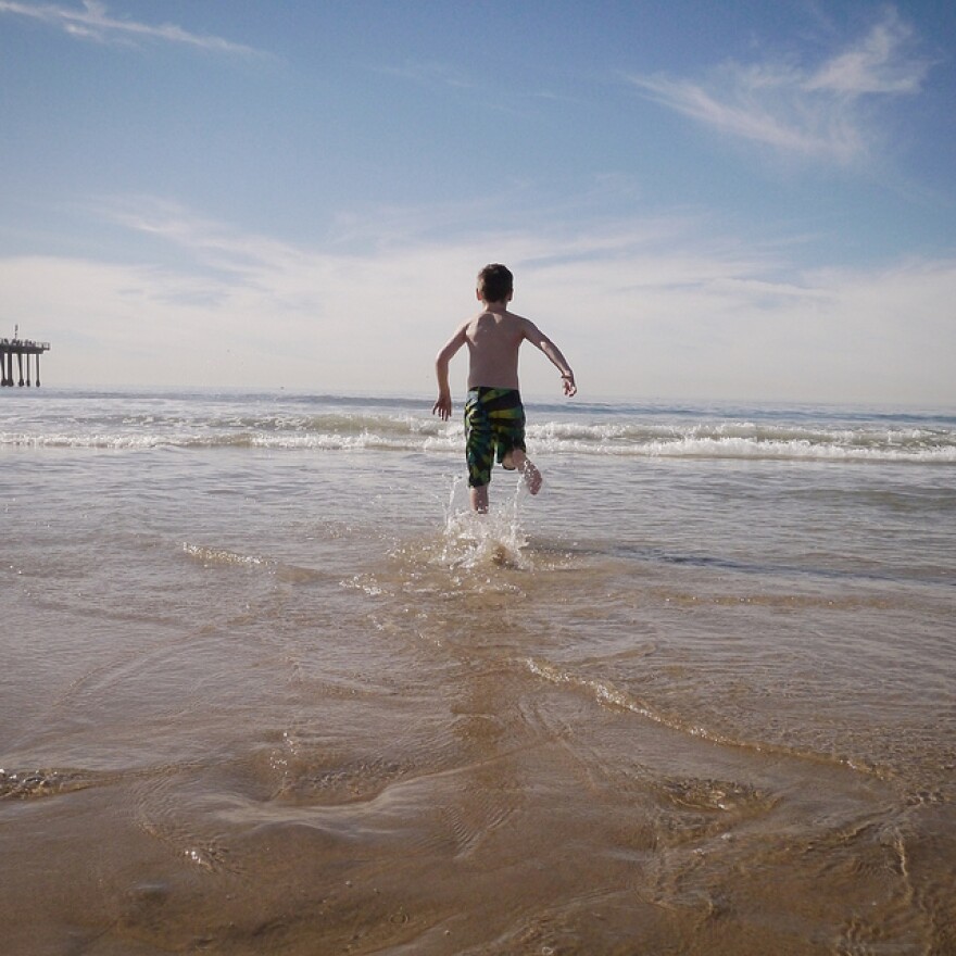 kid frolics in december surf.jpg