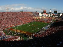 LOS ANGELES, CA - DECEMBER 01:  General view as the UCLA Bruins kick off to the USC Trojans to start the college football game at the Los Angeles Memorial Coliseum on December 1, 2007 in Los Angeles, California. The Trojans defeated the Bruins 24-7.  (Photo by Christian Petersen/Getty Images)