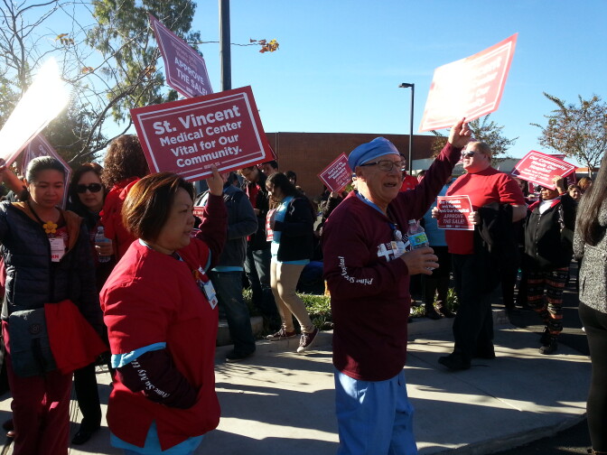 California Nurses Association members march outside of Monday's Lynwood public hearing in support of the proposed sale of the Daughters of Charity Hospitals to Prime Healthcare.