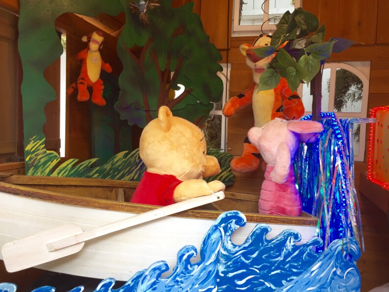 The inside of Steven Dobbs's "Winnfred the Poof" cabin showcasing Winnie the Pooh and the Blustery Day. The boat and figures is animated with gears with a soundtrack playing in the background.
