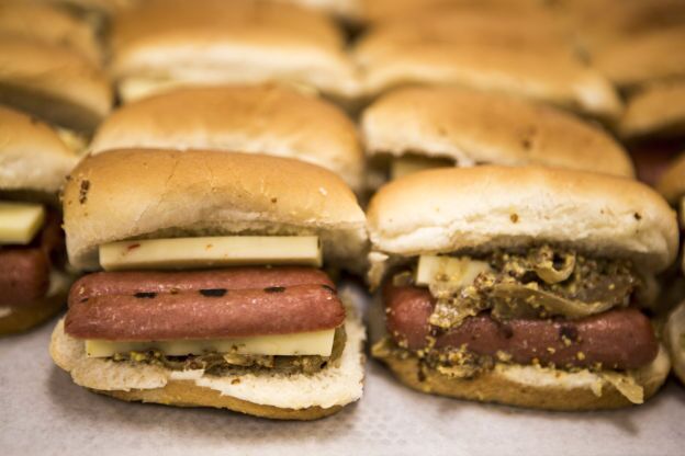 Specialty hot dog paninis are prepped in one of the Staples Center's main three kitchens. 