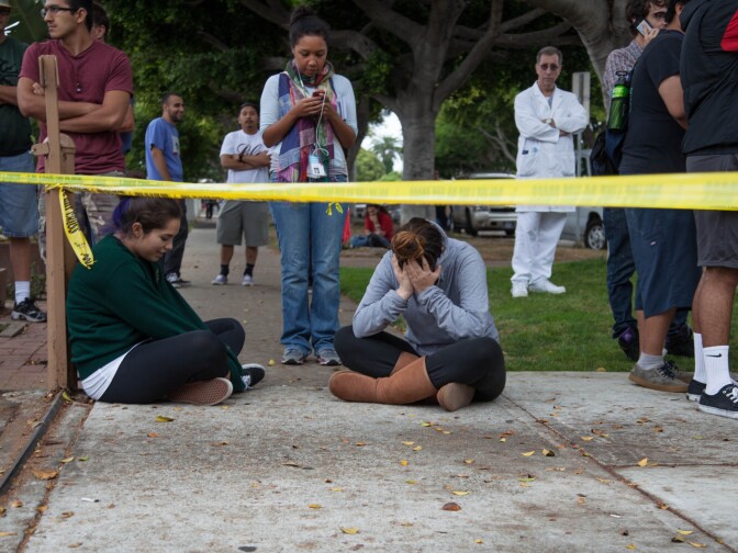 A student waits on the periphery of the Santa Monica College campus on Friday afternoon.