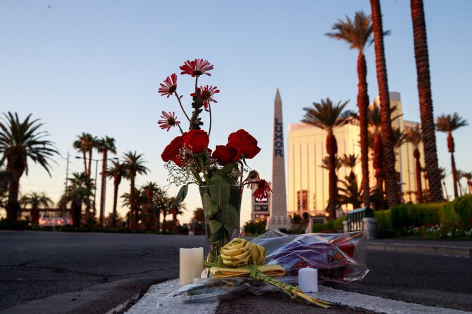 LAS VEGAS, NV - OCTOBER 3: Flowers were left on Las Vegas Blvd. near the scene of Sunday night's mass shooting, October 3, 2017 in Las Vegas, Nevada. The gunman, identified as Stephen Paddock, 64, of Mesquite, Nevada, allegedly opened fire from a room on the 32nd floor of the Mandalay Bay Resort and Casino on the music festival, leaving at least 58 people dead and over 500 injured. According to reports, Paddock killed himself at the scene. The massacre is one of the deadliest mass shooting events in U.S. history. (Photo by Drew Angerer/Getty Images)