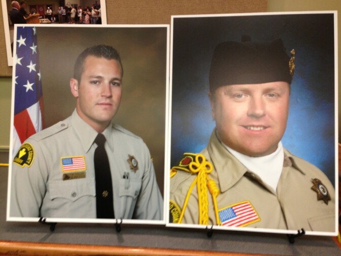 Displays from a San Bernardino County Sheriff's Department press conference showing two deputies shot by alleged murderer and ex-LAPD officer Christopher Dorner.