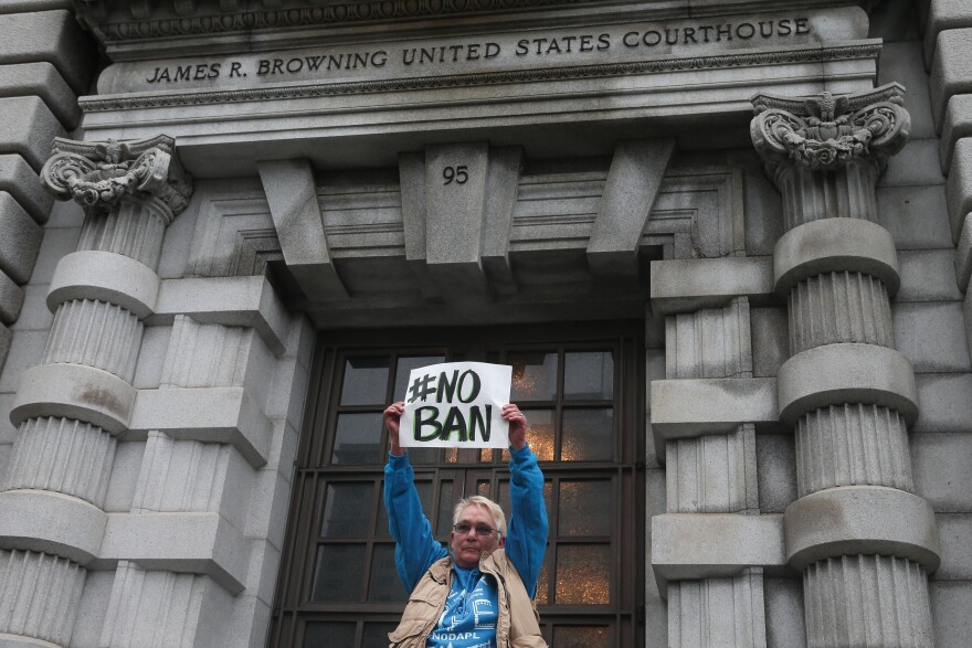 SAN FRANCISCO, CA - FEBRUARY 7: Opponents of U.S. President Donald Trump's executive order imposing a temporary immigration ban on seven Muslim-majority nations protest outside a federal appeals court February 7, 2016 in San Francisco, California. A three-judge panel heard oral arguments and will now decide whether to lift the stay or leave it in place. (Photo by Elijah Nouvelage/Getty Images)