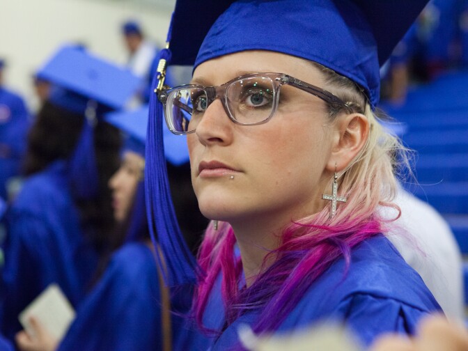 A student looks for her friends before the Santa Monica College graduation on June 11th, 2013.