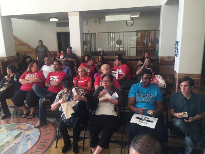 Labor activists wait in the lobby as the Santa Monica City Council meets in closed session Tuesday, Sept. 29, 2015.