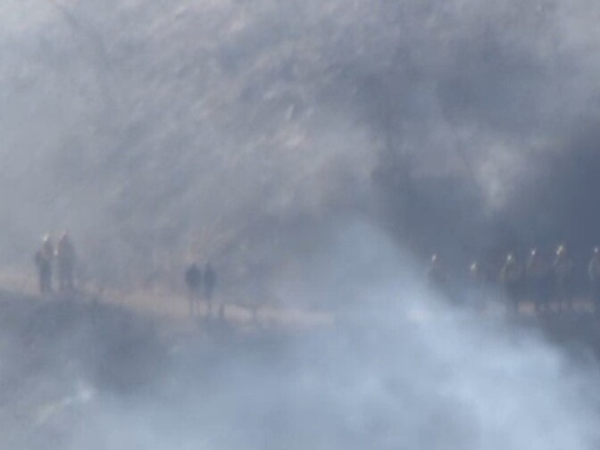 A screenshot of footage of a handcrew near the Scherpa Fire on Wednesday, June 15, 2016.