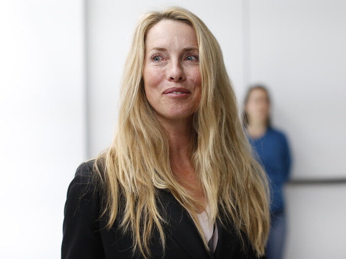 SAN FRANCISCO, CA - MARCH 9: Laurene Powell Jobs, widow of late Apple founder and CEO Steve Jobs, is seen among the crowd after an Apple special event at the Yerba Buena Center for the Arts on March 9, 2015 in San Francisco, California. Apple Inc. announced the new MacBook as well as more details on the much anticipated Apple Watch, the tech giant's entry into the rapidly growing wearable technology segment as well (Photo by Stephen Lam/Getty Images)