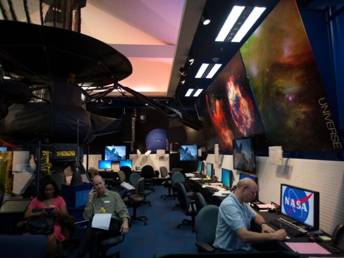 Members of the media outreach team work in the newsroom at the Jet Propulsion Laboratory in Pasadena.