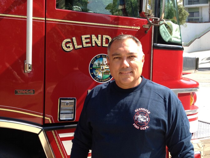 Fire Captain Cordell Harges of Glendale's 23rd Fire Company. He and his fire fighters spent Saturday reassuring Chevy Chase Canyon residents that the fire was contained and advising them on brush clearance.