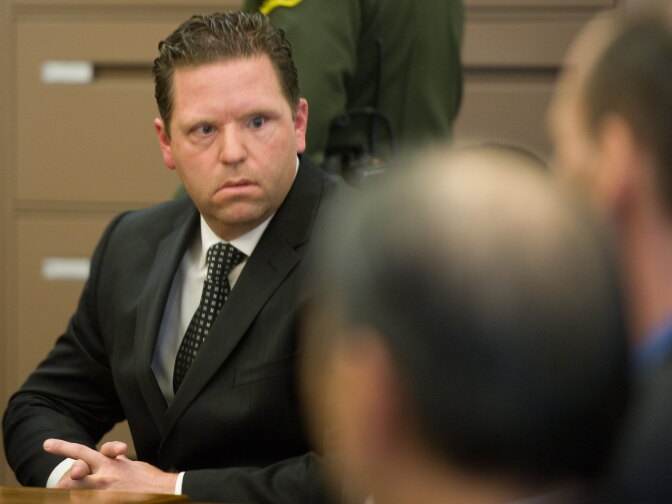 Former Fullerton police Officer Jay Cicinelli was  acquitted of involuntary manslaughter and assault under color of authority for his role in the July 5, 2011, beating of transient Kelly Thomas. He put his head in his hands and kept his head down immediately after hearing he would walk free. 
POOL PHOTO, MINDY SCHAUER, ORANGE COUNTY REGISTER