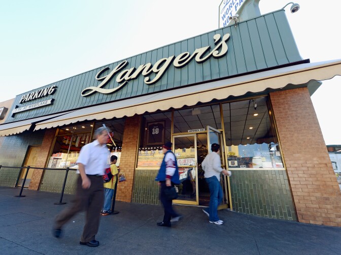 LOS ANGELES, CA - FEBRUARY 26:  Customers leave Langer's Delicatessen after eating lunch on February 26, 2013 in Los Angeles, California. According to a report, America's Jewish delis are struggling to stay afloat. There were several thousand Jewish delis open in New York City during the first half of the 20th century, now there are only a few dozen.  (Photo by Kevork Djansezian/Getty Images)