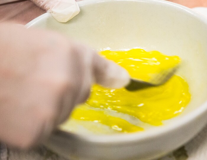 Whipping up some eggs for the scramble in migas breakfast tacos.