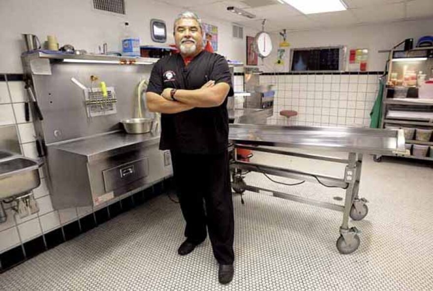 Vidal Herrera owns 1800Autospy in Los Angeles, CA May 18, 2011.  Herrera wants to franchise his business and hopes veterans coming back  from war will open autopsy businesses around the U.S.(Andy Holzman/Daily News Staff Photographer)