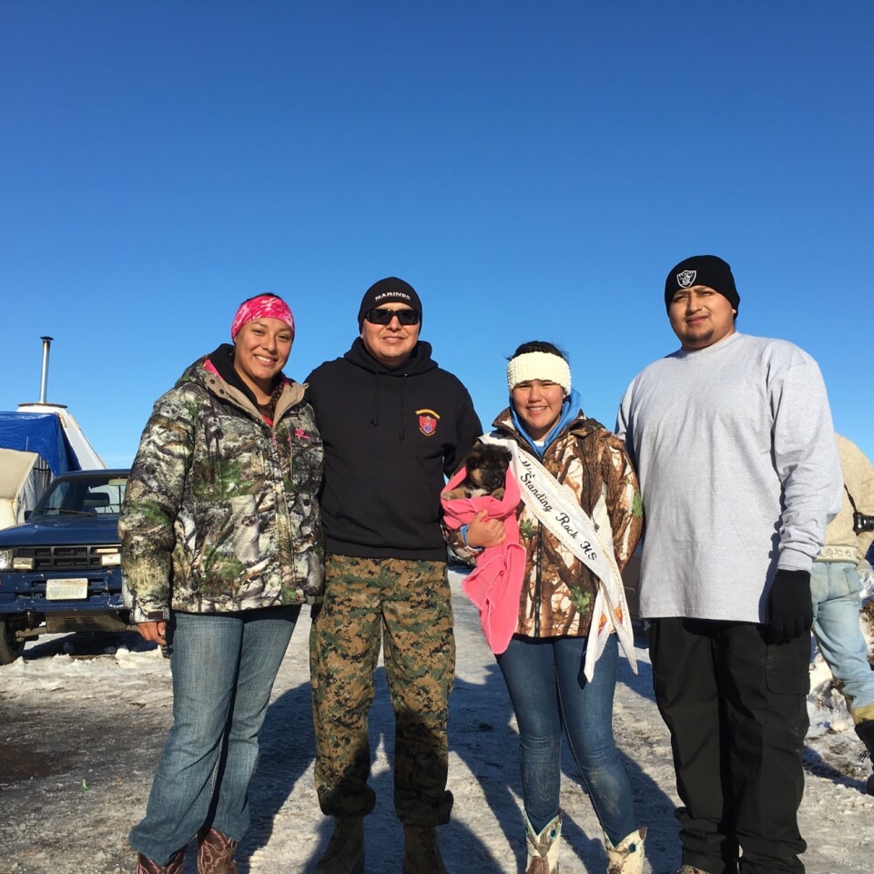 Anderson Gould, a Marine veteran and resident of San Clemente, CA, second from left, at the Standing Rock site in North Dakota where he joined the encampment with other veterans.