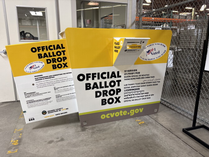 A look at a large steel bin that is the official ballot drop box for Orange County: On the side and door is language explaining how the box works, along with directions to a website to help with more information: OCVote.gov