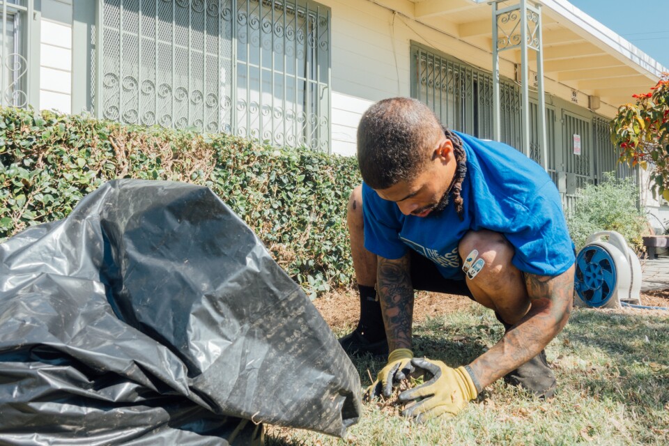 Volunteers with The Mission Continues helped spruce up the landscaping at Gonzaque Village in Watts.