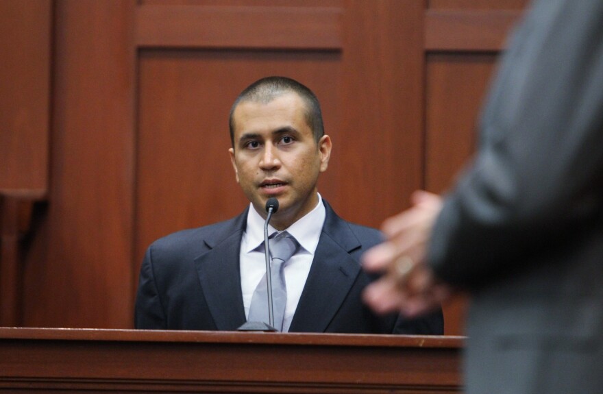 SANFORD, FL- APRIL 20: George Zimmerman (L) speaks on the stand as he answers questions from his his attorney Mark O'Mara in a Seminole County courtroom during his bond hearing on April 20, 2012 in Sanford, Florida. Trayvon Martin was shot by George Zimmerman, a member of a neighborhood watch in Sanford, Florida, who has been charged with second degree murder in the shooting. Bail was set at $150,000 and Zimmerman and could be released from jail as he awaits trial as early as April 21.  (Photo by Gary Green/The Orlando Sentinel-Pool/Getty Images)