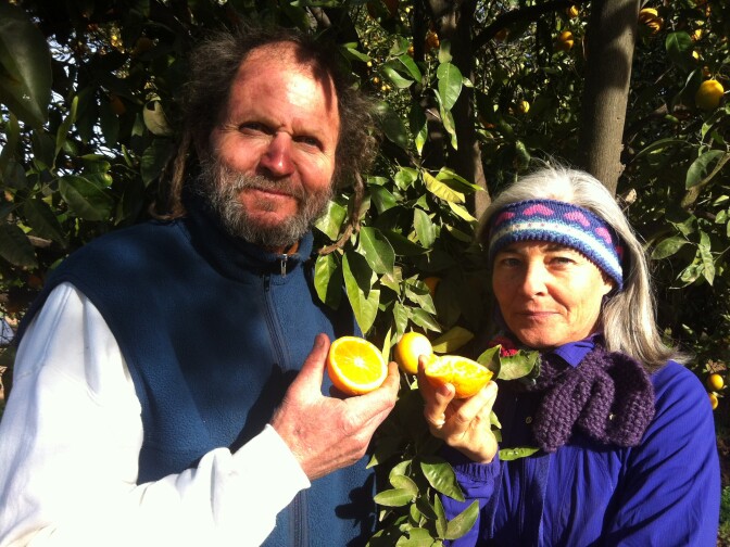 Earthtrine Farms' Bob Dautch with Kerry Clasby, a buyer for high-end restaurants.