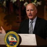 SACRAMENTO, CA - SEPTEMBER 08:  California Gov. Jerry Brown speaks during an portrait unveiling ceremony in the Rotunda of the State Capitol on September 8, 2014 in Sacramento, California. Former California Gov. Arnold Schwarzenegger was joined by current Gov. Jerry Brown to unveil his official gubernatorial portrait at the State Capitol.  (Photo by Justin Sullivan/Getty Images)