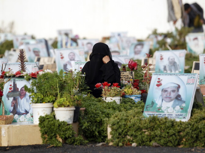 A Yemeni woman sits next to the grave of a loved one in a cemetery in the capital Sana on June 25, 2017 after the Eid al-Fitr prayer, which marks the end of the holy month of Ramadan. / AFP PHOTO / Mohammed HUWAIS        (Photo credit should read MOHAMMED HUWAIS/AFP/Getty Images)