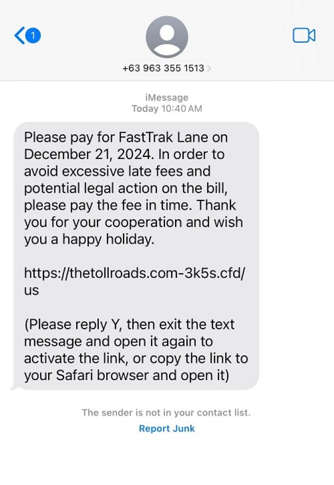 A screenshot of a scam text requesting the recipient pay an outstanding toll fee and sharing a fraudulent link.