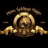 Lion roaring with golden ribbons around it. 