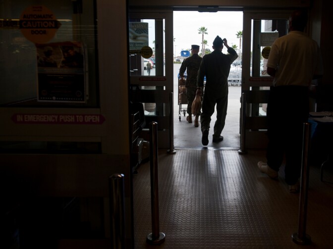 The Camp Pendleton commissary remains open on Tuesday, in order to sell off perishable goods. But base officials expect it to close by Wednesday. Customers head to the Commissary parking lot at Camp Pendleton on Jan. 24, 2013. There are 18 checkout stands, along with several self-checkout stands.