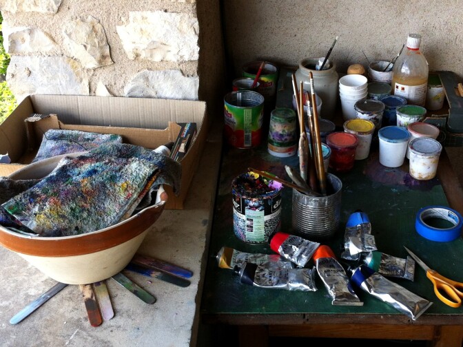 The raw materials in Frank Romero's studio in the South of France. Frank says he buys the cheapest paints he can find.
