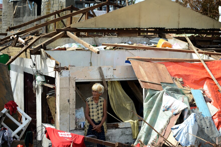 Damage in the aftermath of deadly Typhoon Haiyan in the Philippines. Many Filipino Americans have yet to get word of loved ones' fate.