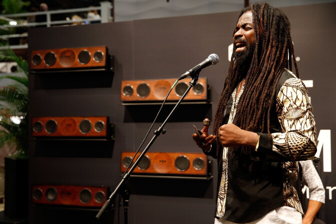 Rocky Dawuni performs at the House of Marley booth during CES 2016 on January 7, 2016 in Las Vegas, Nevada.