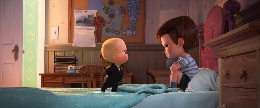 (L-R) Boss Baby (voiced by Alec Baldwin) tries to convince Tim (voiced by Miles Bakshi) that they must cooperate in "The Boss Baby." Photo Credit: DreamWorks Animation.