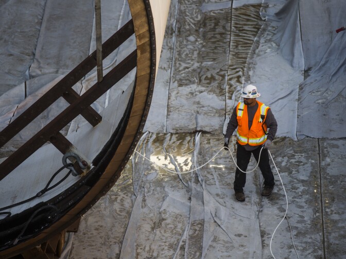 A segment of a tunnel boring machine is lowered into the Regional Connector Transit Project in Little Tokyo on Wednesday morning, Oct. 29, 2016. The project will provide direct connections between Azusa and Long Beach, and East Los Angeles and Santa Monica.