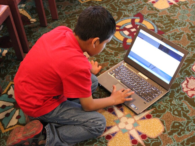 Antonio Martinez, age 7, is building an "Angry Bird" themed game