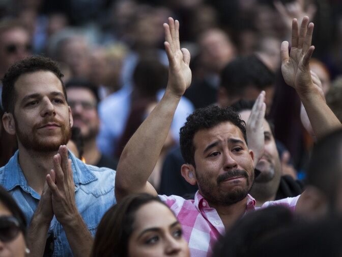 Dickie Hearts of West Adams applauds during a vigil on Monday, June 13, 2016 at Los Angeles City Hall memorializing those who died in Sunday's attack in Orlando.