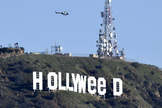 File: The famous Hollywood sign reads "Hollyweed" after it was vandalized, January 1, 2017. 