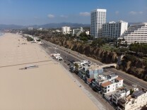 Santa Monica Beach, a very wide,  artificially built, and regularly maintained beach. Photographed on September 9, 2019 in Santa Monica, California. (James Bernal for KPCC)