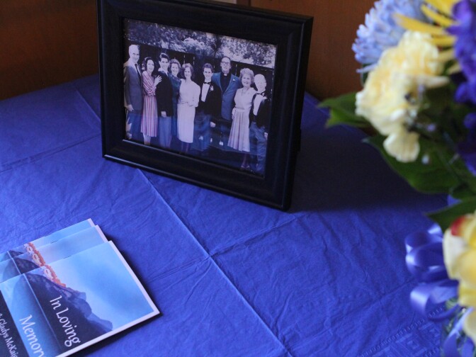 A family photo sits in the church entryway. Byron and Gladys McKaig lost their lives in the Esrkine Fire in June 2016.