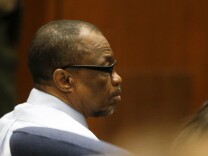 FILE - This May 2, 2016 file photo, Lonnie Franklin Jr., left, appears in Los Angeles Superior Court during closing arguments of his trail in Los Angeles. 