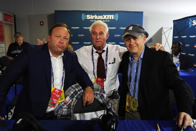 CLEVELAND, OH - JULY 21: Alex Stone, of Infowars, Roger Stone, former Donald Trump advisor, and Jonathan Alter pose for a photo following an episode of Alter Family Politics on SiriusXM at Quicken Loans Arena on July 20, 2016 in Cleveland, Ohio. (Photo by Ben Jackson/Getty Images for SiriusXM)